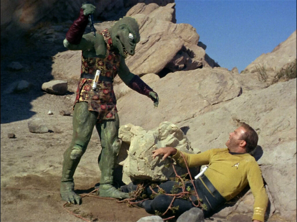 William Shatner: “I Have Never Watched Star Trek” but My Reason Isn’t Because I Hate the Franchise 6 Star Trek Arena The Gorn traps Captain Kirk Credit NBC