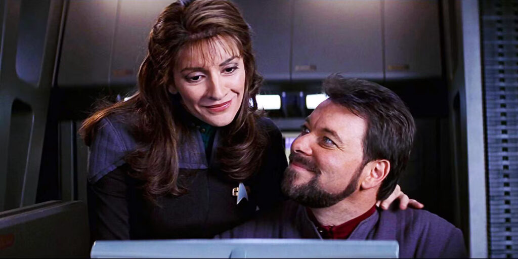 Marina Sirtis: Jonathan Frakes and I “Kept it going” Even Though Star Trek: TNG Warned Us to Drop the Riker-Troi Romance Arc 16 Deanna Troi and William Riker share a soft moment