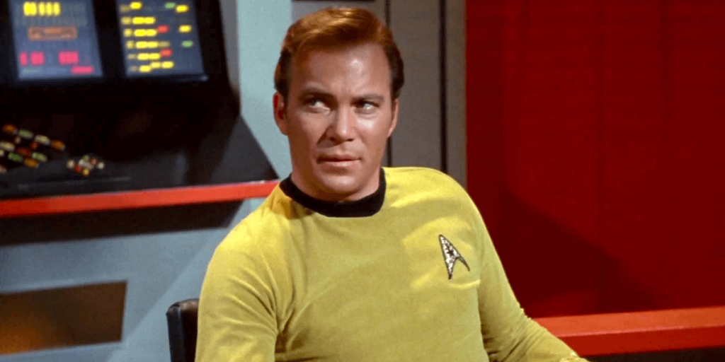 The United States Actually Has More Than Enough Money Right Now To Build Star Trek’s USS Enterprise 2 Captain James T. Kirk sitting on USS Enterprise in Star Trek
