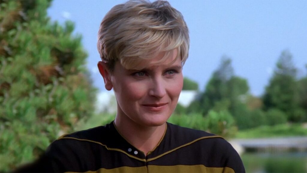 Star Trek Almost Made Tasha Yar Asian, the Actress Had to Settle for Another TNG Role 6 A smiling Denise Crosby as Tasha Yar in Star Trek: TNG