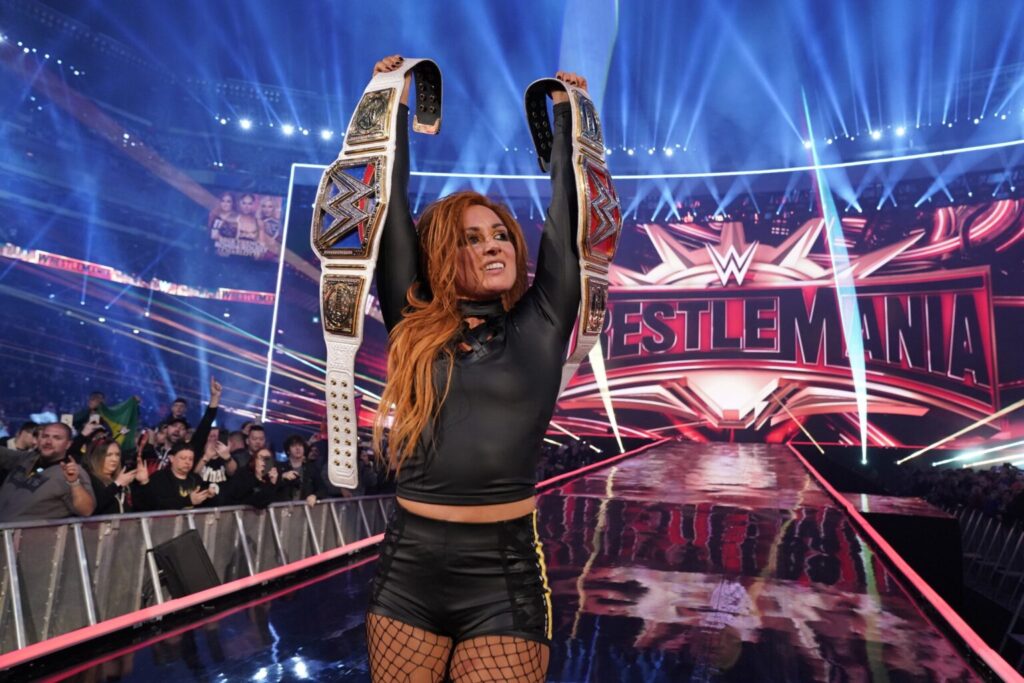 WWE Legend on Her Upcoming Star Trek Debut: "I'm on the bridge crew" 3 Becky Lynch holds up two championship belts