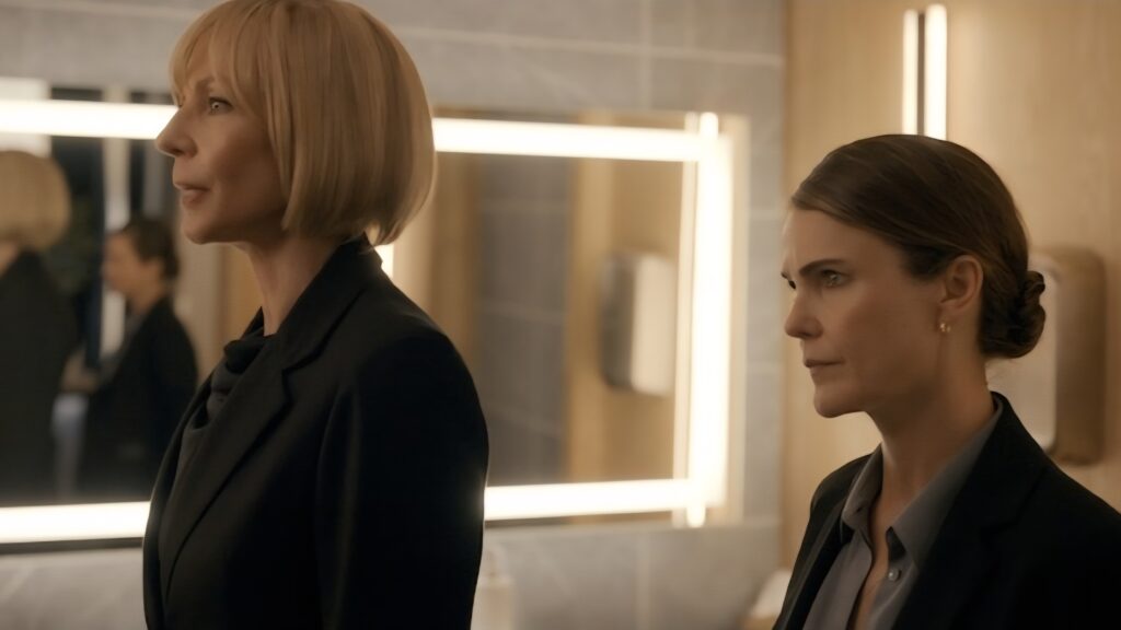 The Diplomat Season 3 Review — Keri Russell is Magnetic in a Series that is Pure, Pulpy, Plot-driven Addiction 30 Two women talk in the bathroom