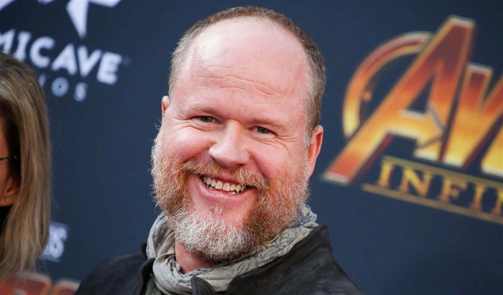 American filmmaker, composer, and comic book writer, Joss Whedon, who has worked with Nathan Fillion.