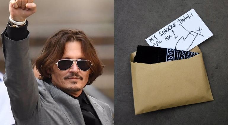 Johnny Depp giving out handwritten thank you notes to his well-wishers