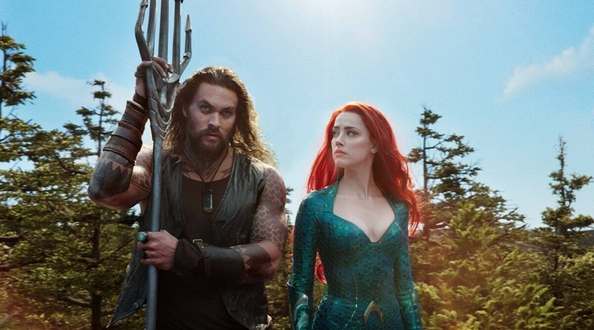 Jason Momoa and Amber Heard in Aquaman (2018).