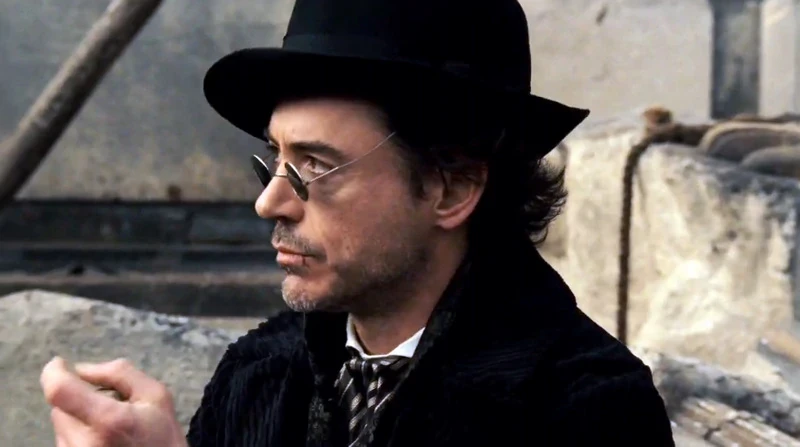 Robert Downey Jr. as in and as Sherlock Holmes (2009).