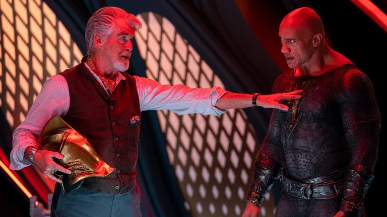 Pierce Brosnan as Dr. Fate sharing the screen with Dwayne Johnson as Black Adam.