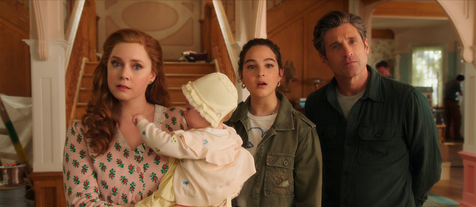 (L-R): Amy Adams as Giselle, Sofia (played by Mila & Lara Jackson), Gabriella Baldacchino as Morgan Philip, and Patrick Dempsey as Robert Philip in Disney's live-action DISENCHANTED, exclusively on Disney+. Courtesy of Disney Enterprises; Inc. © 2022 Disney Enterprises, Inc. All Rights Reserved.