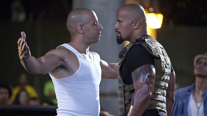 Vin Diesel and Dwayne Johnson as Dom Toretto and Luke Hobbs