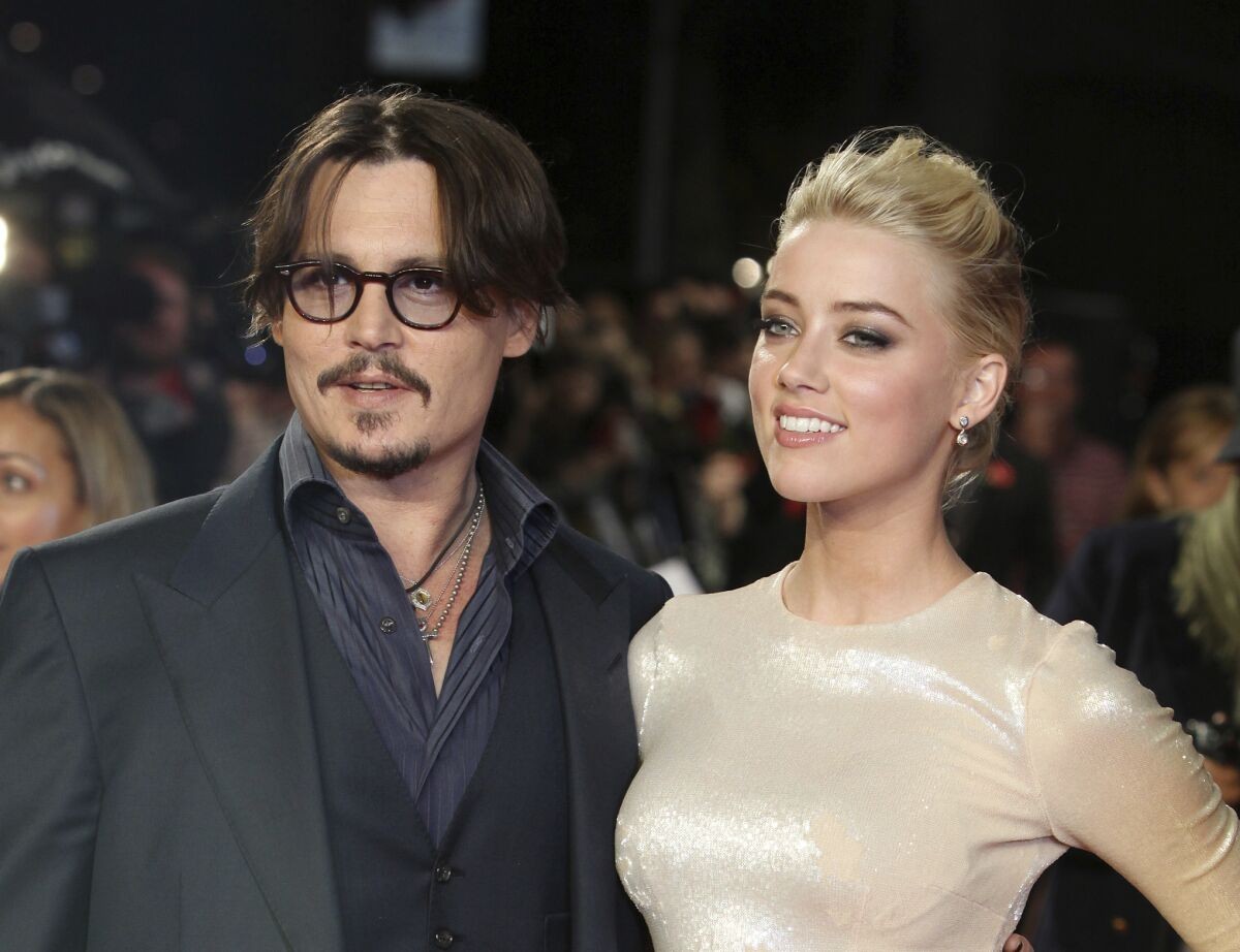 Amber Heard and Johnny Depp before the misfortunate events.