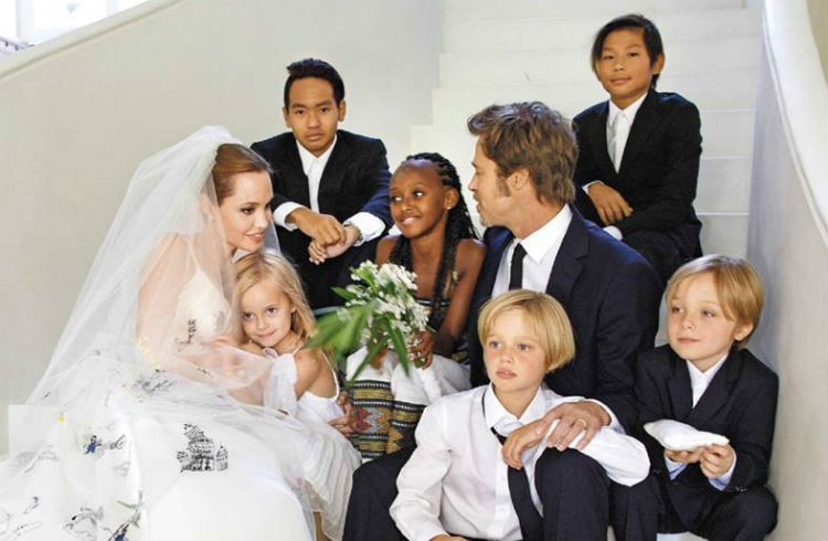 Angelina Jolie and Brad Pitt at their wedding