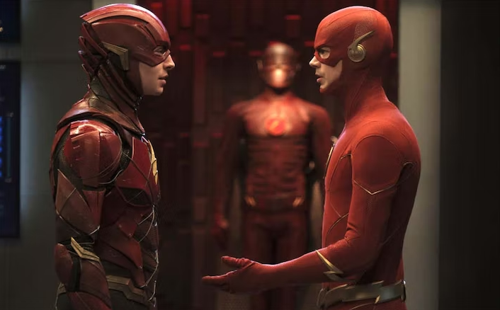 Ezra Miller and Grant Gustin as The Flash