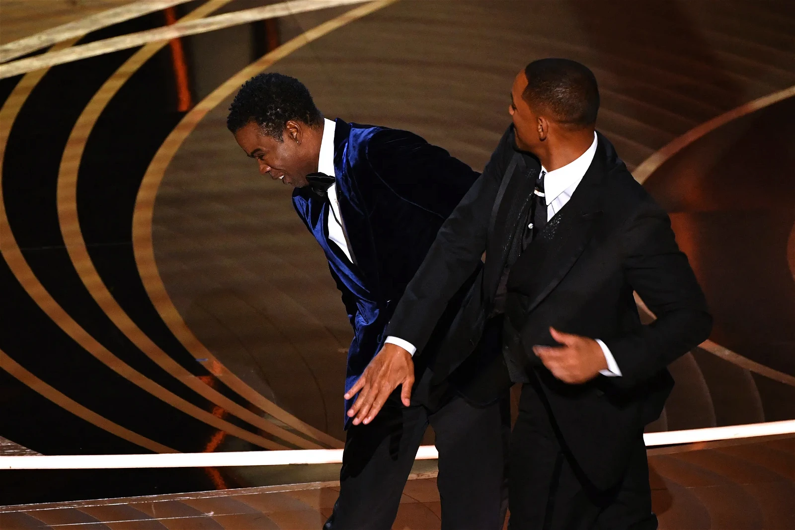 Will Smith slaps Chris Rock at the Oscars 2021.