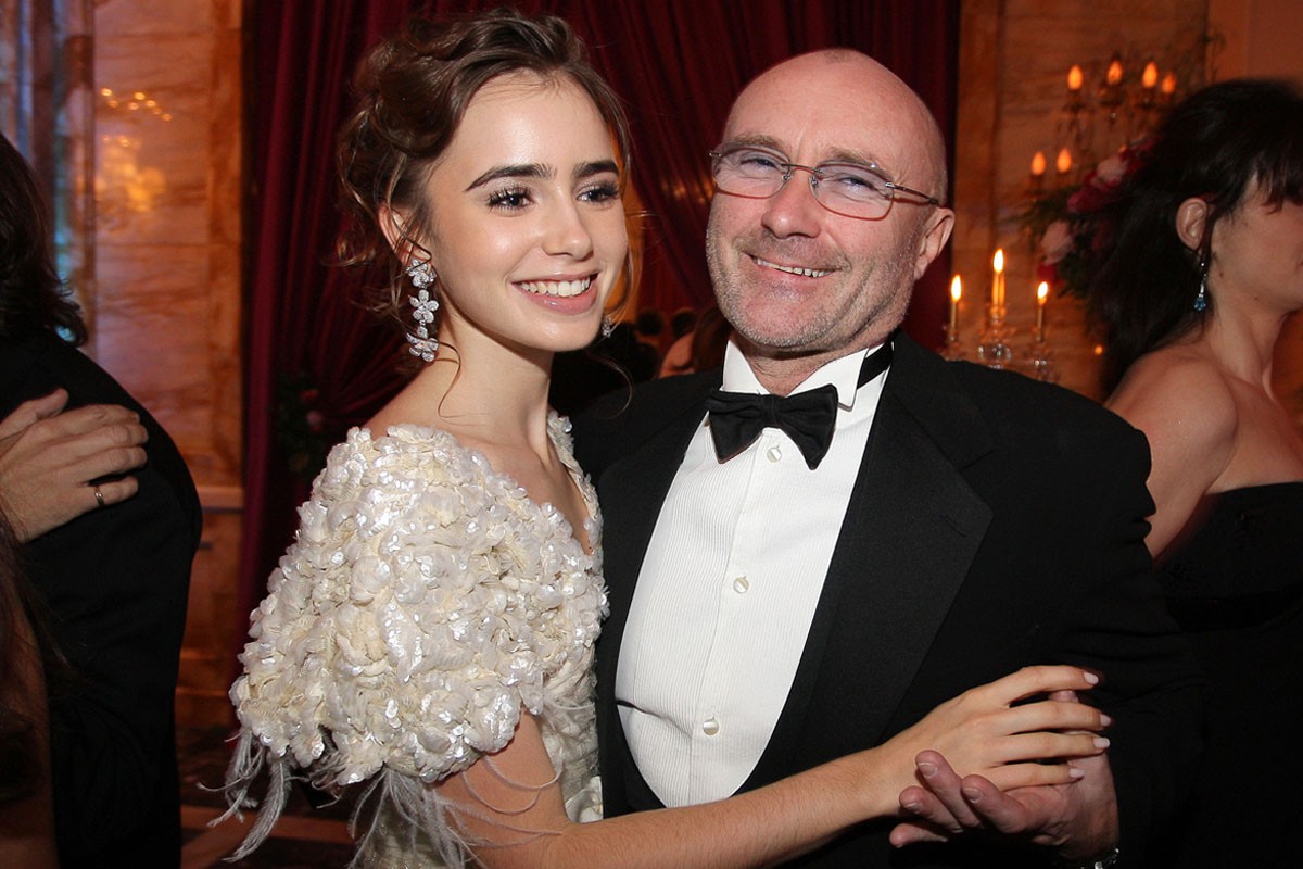 Lily Collins with her father, Phil Collins