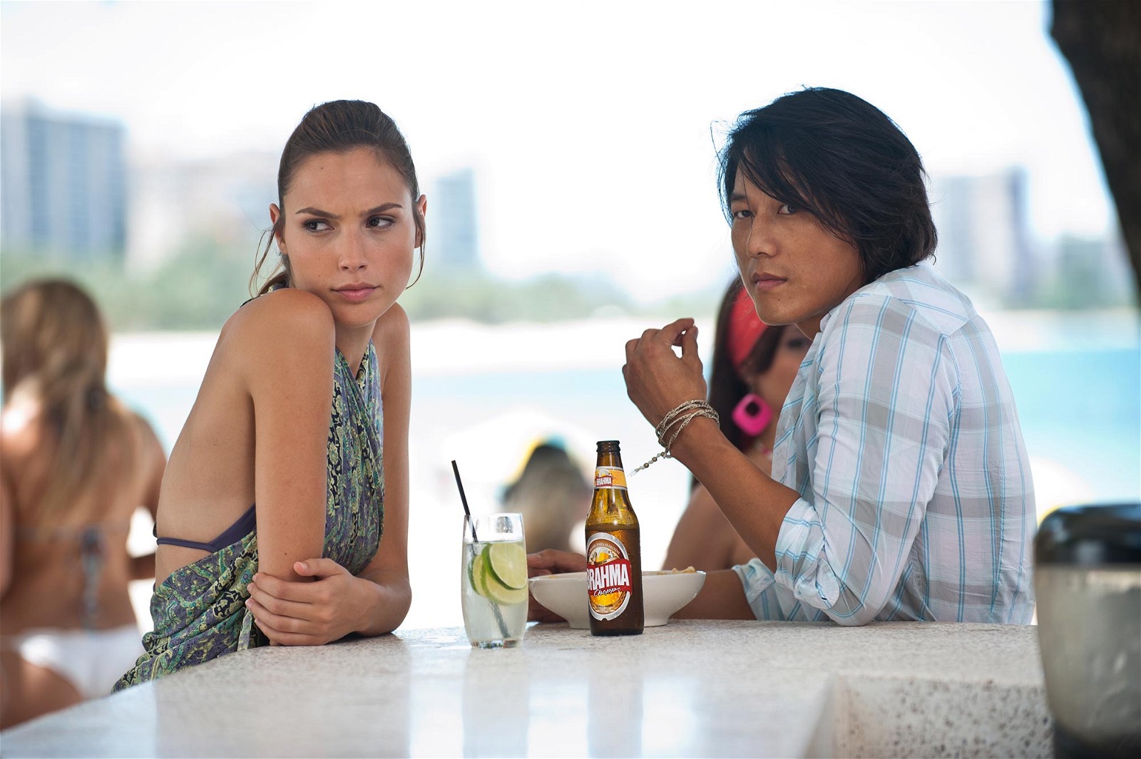 Gal Gadot and Sung Kang in Fast Five (2011).
