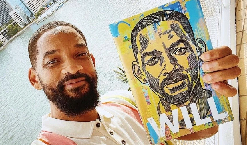 Will Smith with his autobiography