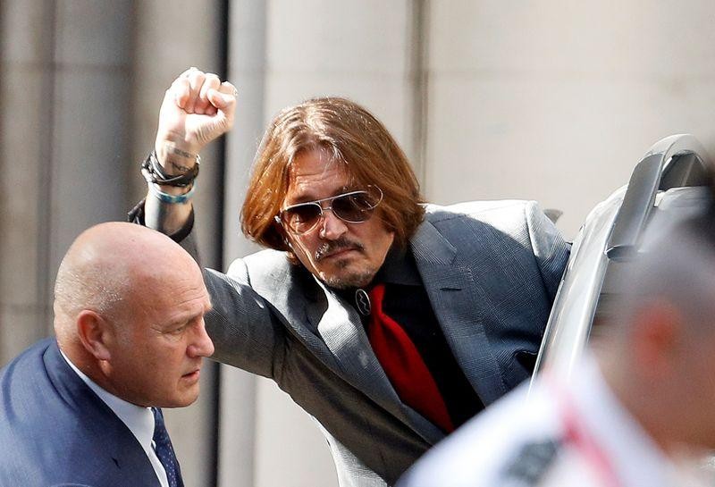 Johnny Depp exiting the Royal Court, London