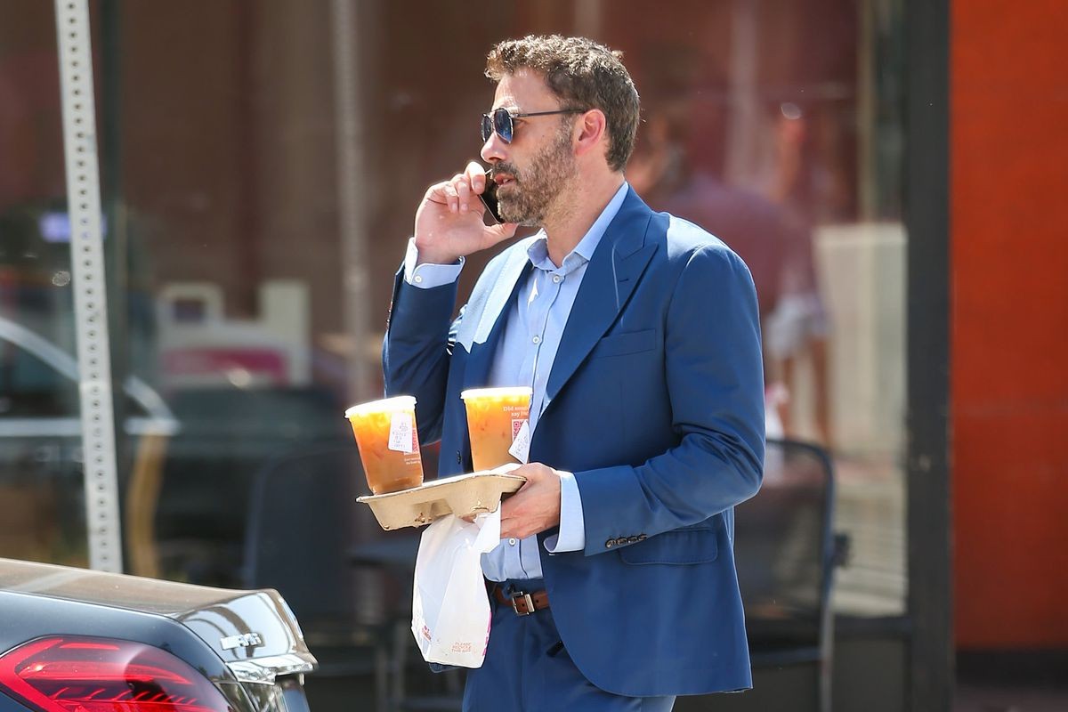 Ben Affleck with Dunkin' Donuts coffee