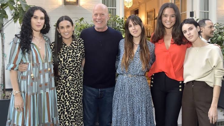 Bruce Willis with his wives and daughters