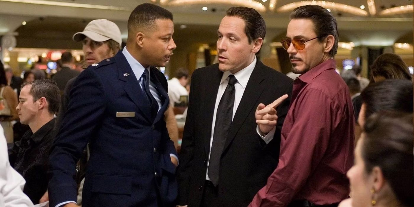Terrence Howard, Jon Favereau, and Robert Downey Jr. in Iron Man (2008).