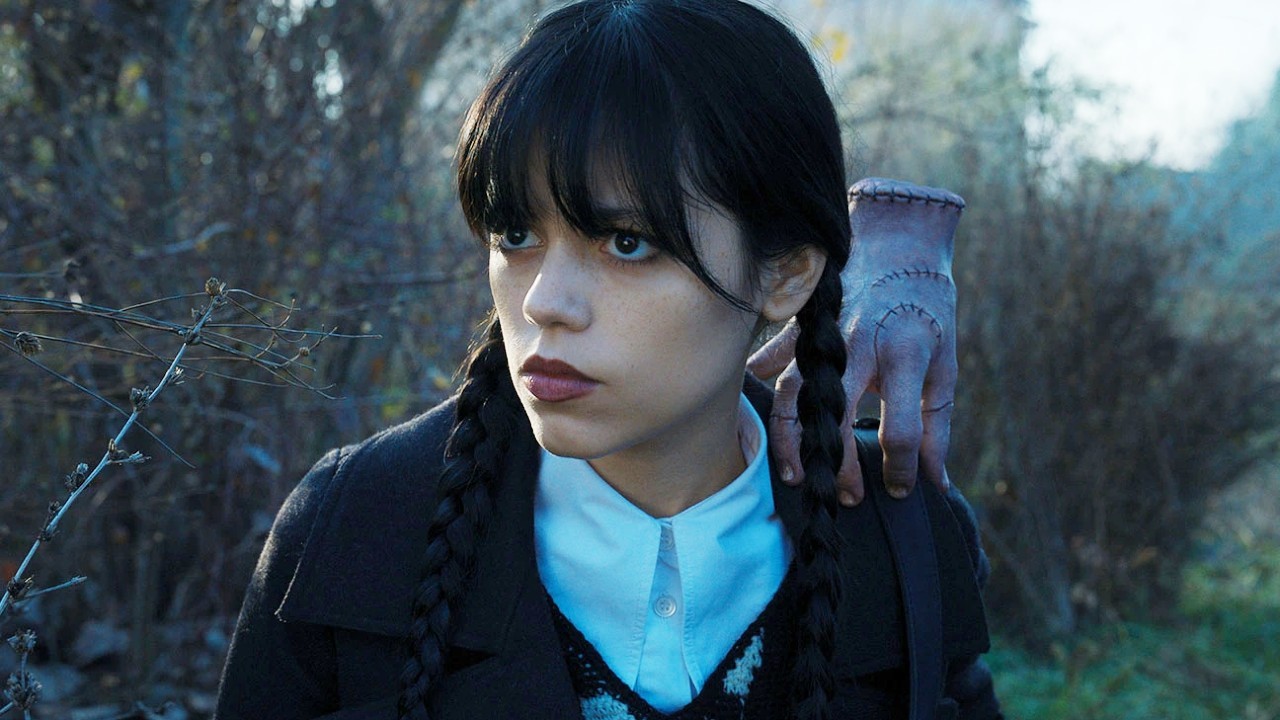 Jenna Ortega as and in Wednesday