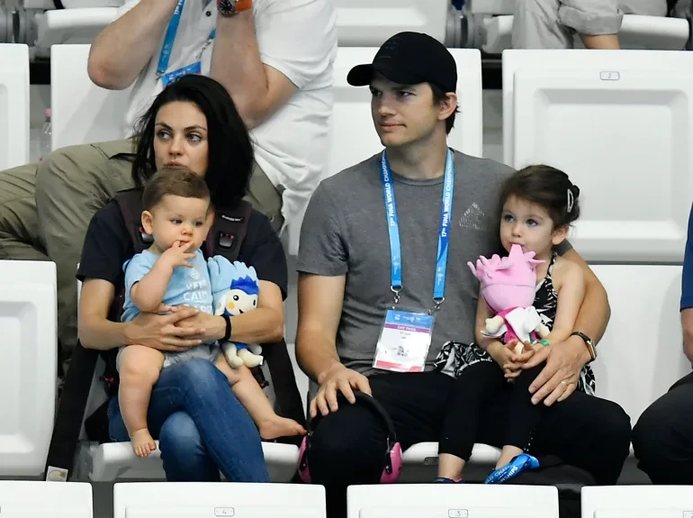 Mila Kunis and Ashton Kutcher with their kids
