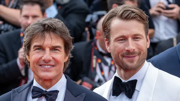 Glen Powell with Tom Cruise
