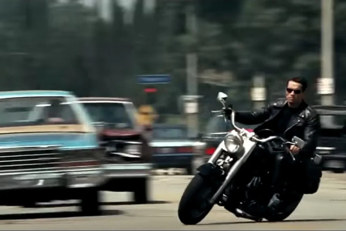 Arnold Schwarzenegger riding "Fat Boy" in the Terminator franchise.