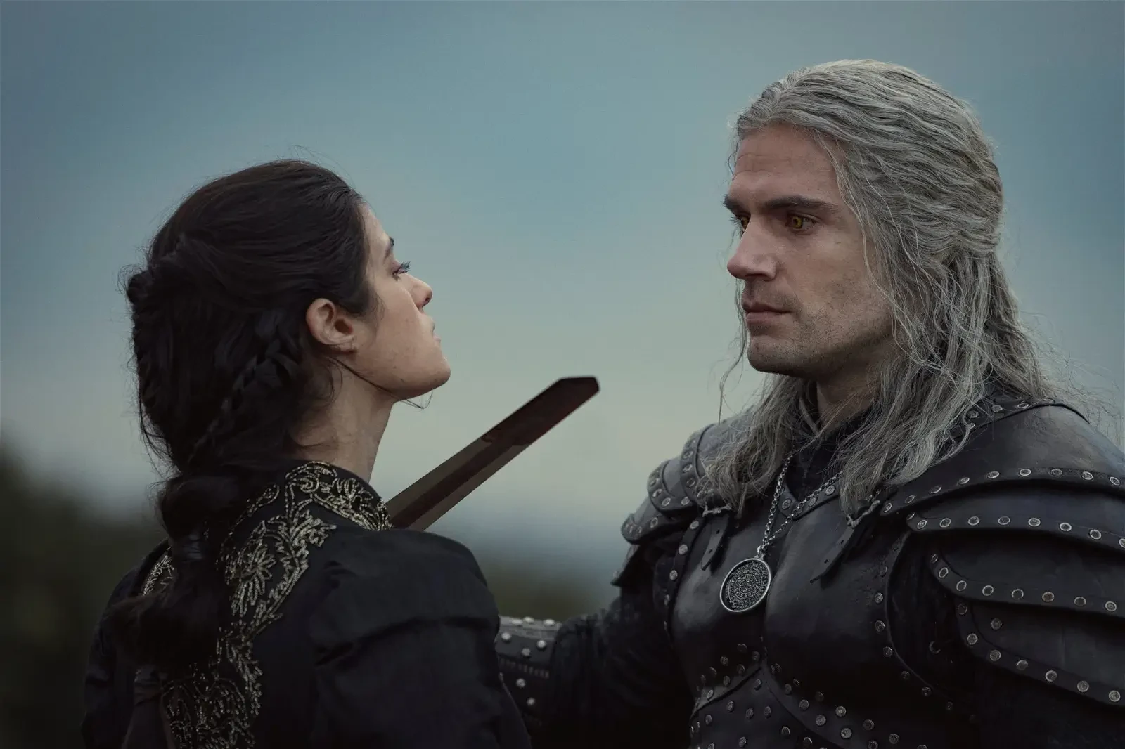 Anya Chalotra and Henry Cavill as Yennefer and Geralt