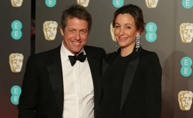 Hugh Grant and Anna Eberstein at the BAFTA