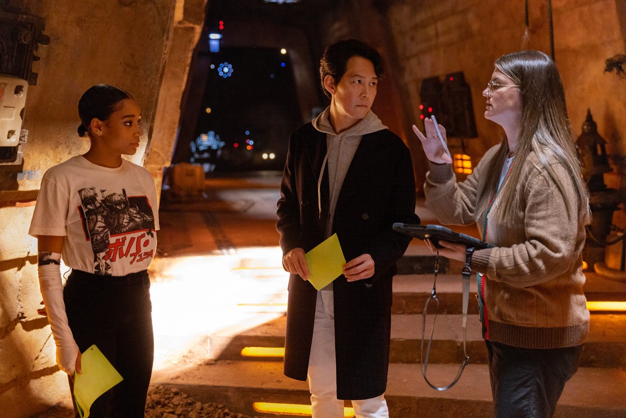 Leslye Headland with Amandla Stenberg and Lee Jung-jae on the set of The Acolyte