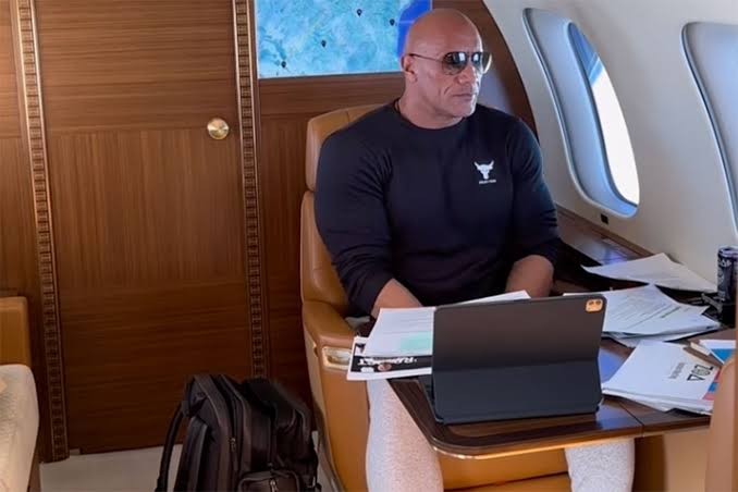 Dwayne Johnson in a private plane 