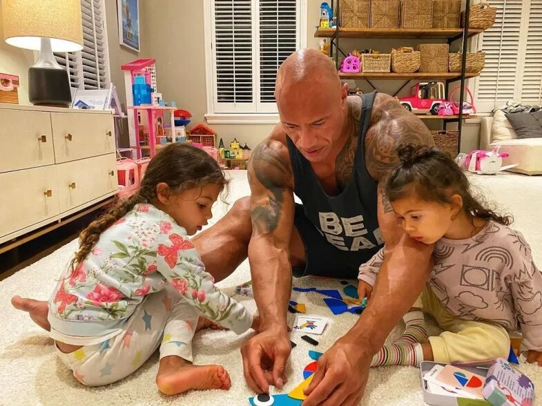 Dwayne Johnson with his daughters