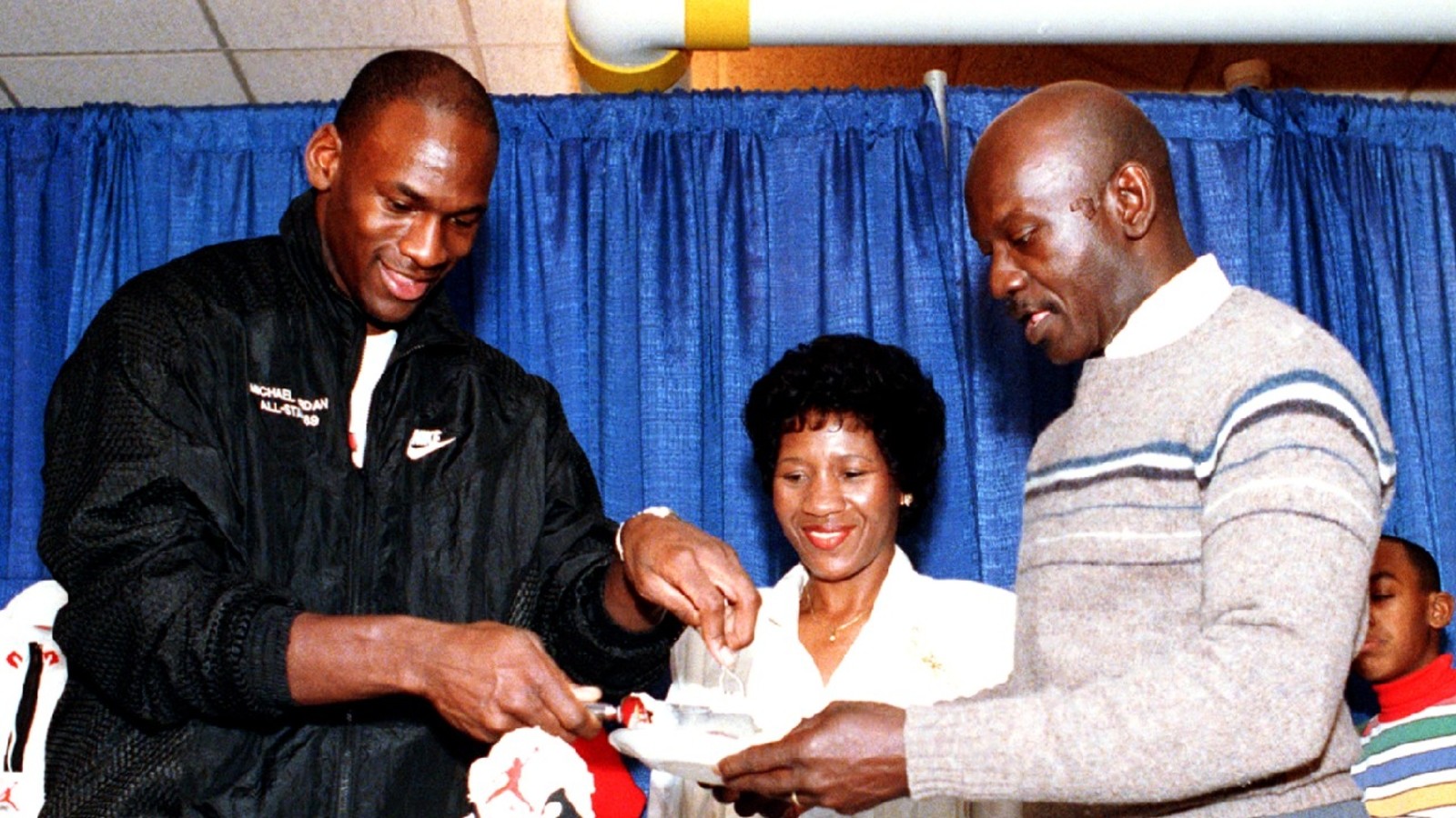 Michael Jordan and his parents Deloris, and James Jordan