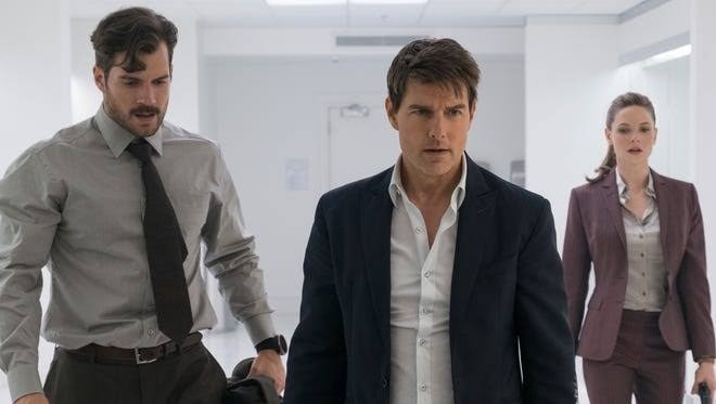 Tom Cruise as Ethan Hunt and Henry Cavill as August Walker in Mission Impossible: Fallout.