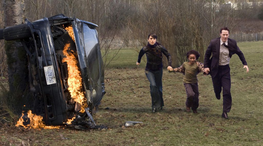 Keanu Reeves, Jaden Smith, and, Jennifer Connely in The Day the Earth Stood Still (2008).