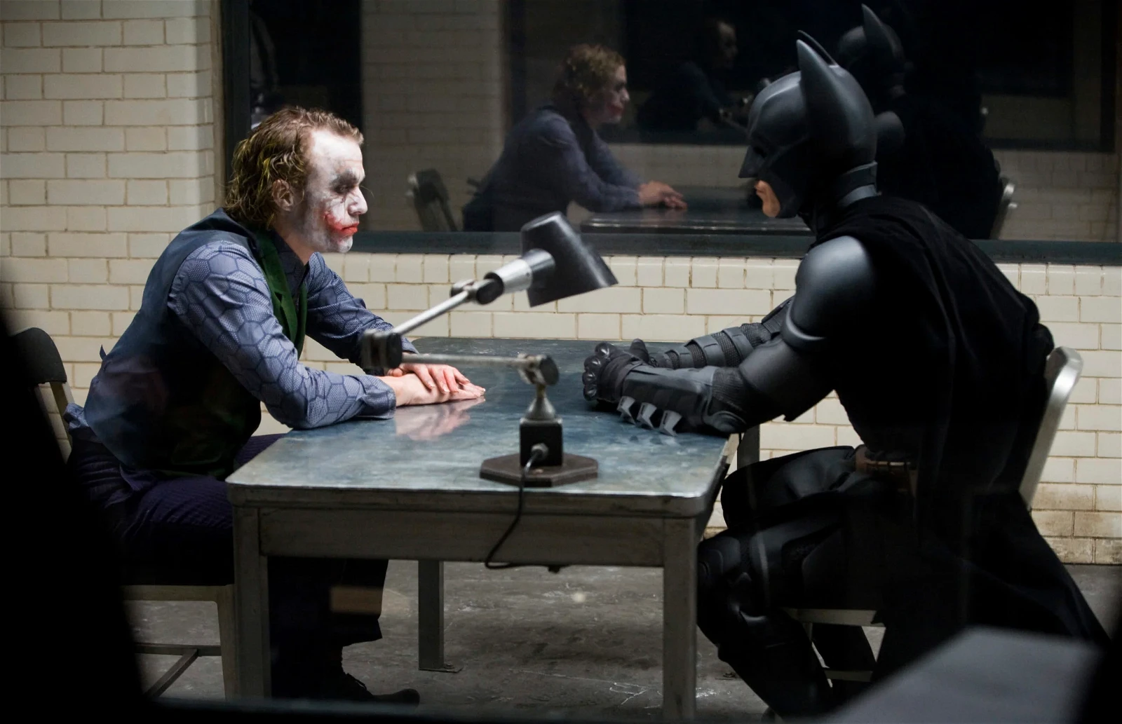 Heath Ledger as the Joker and Christian Bale as Batman