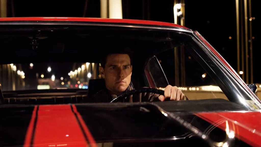 Tom Cruise in and as Jack Reacher (2012)