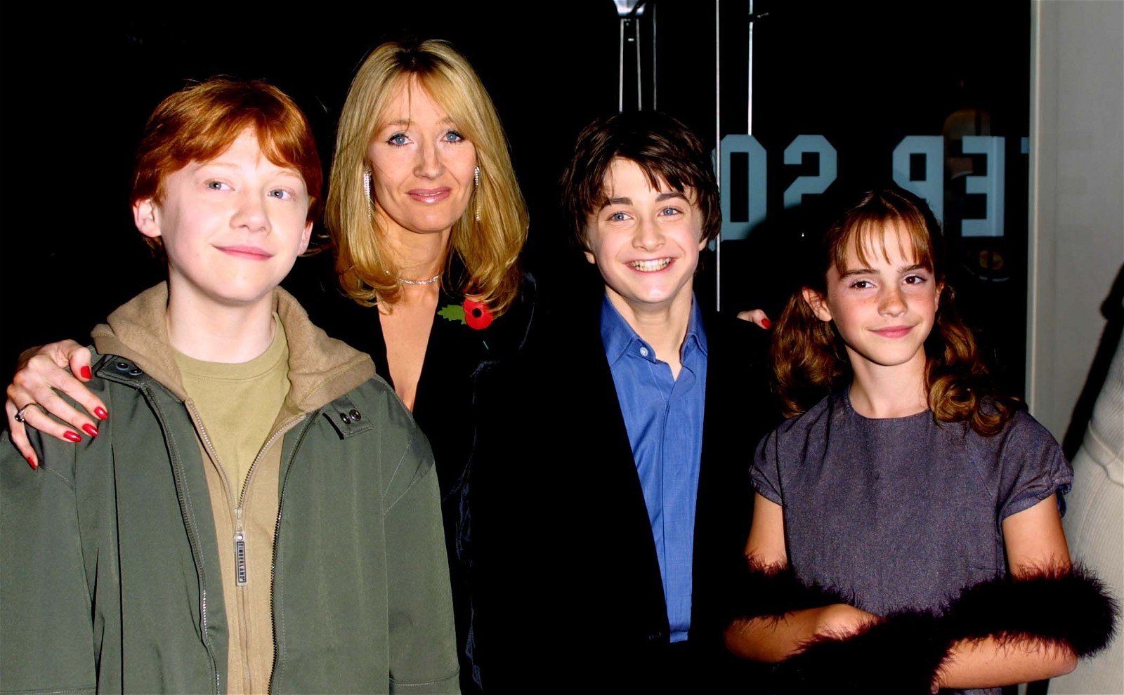 J.K. Rowling with Daniel Radcliffe, Emma Watson, and Rupert Grint
