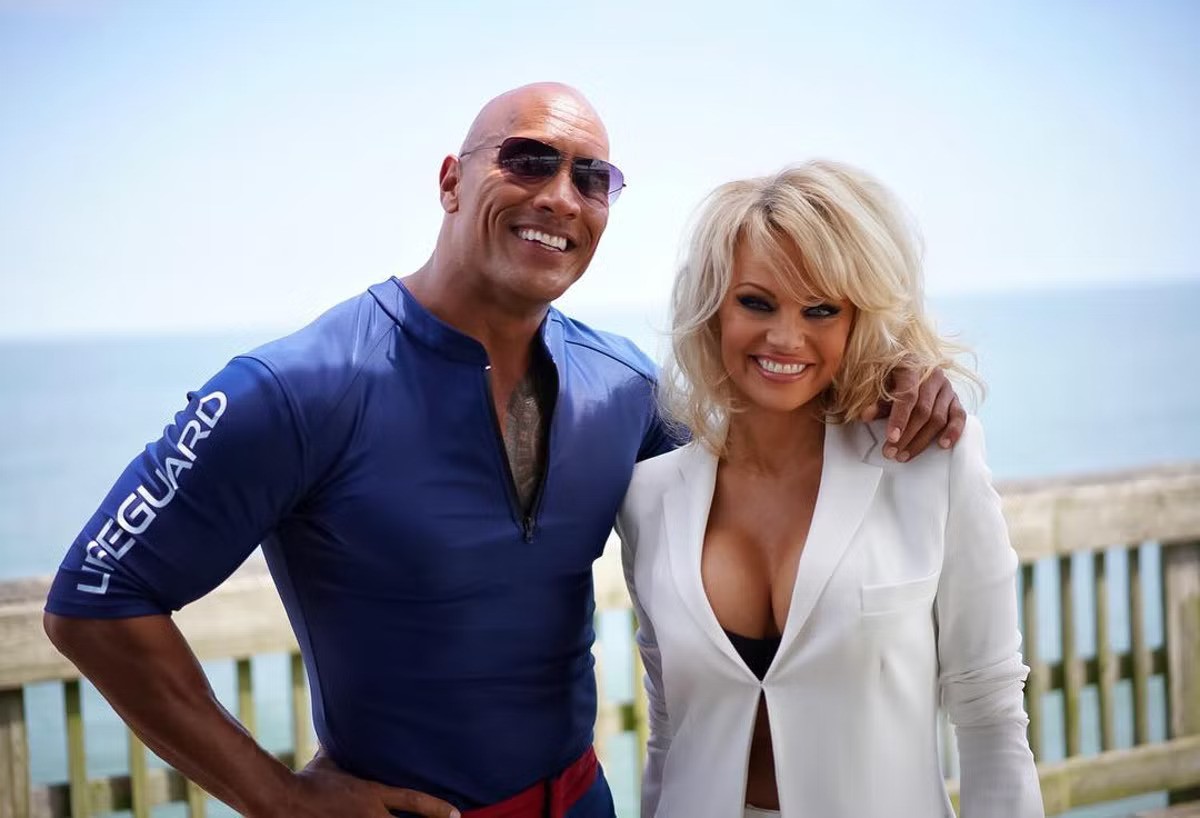 Pamela Anderson and The Rock on Baywatch set