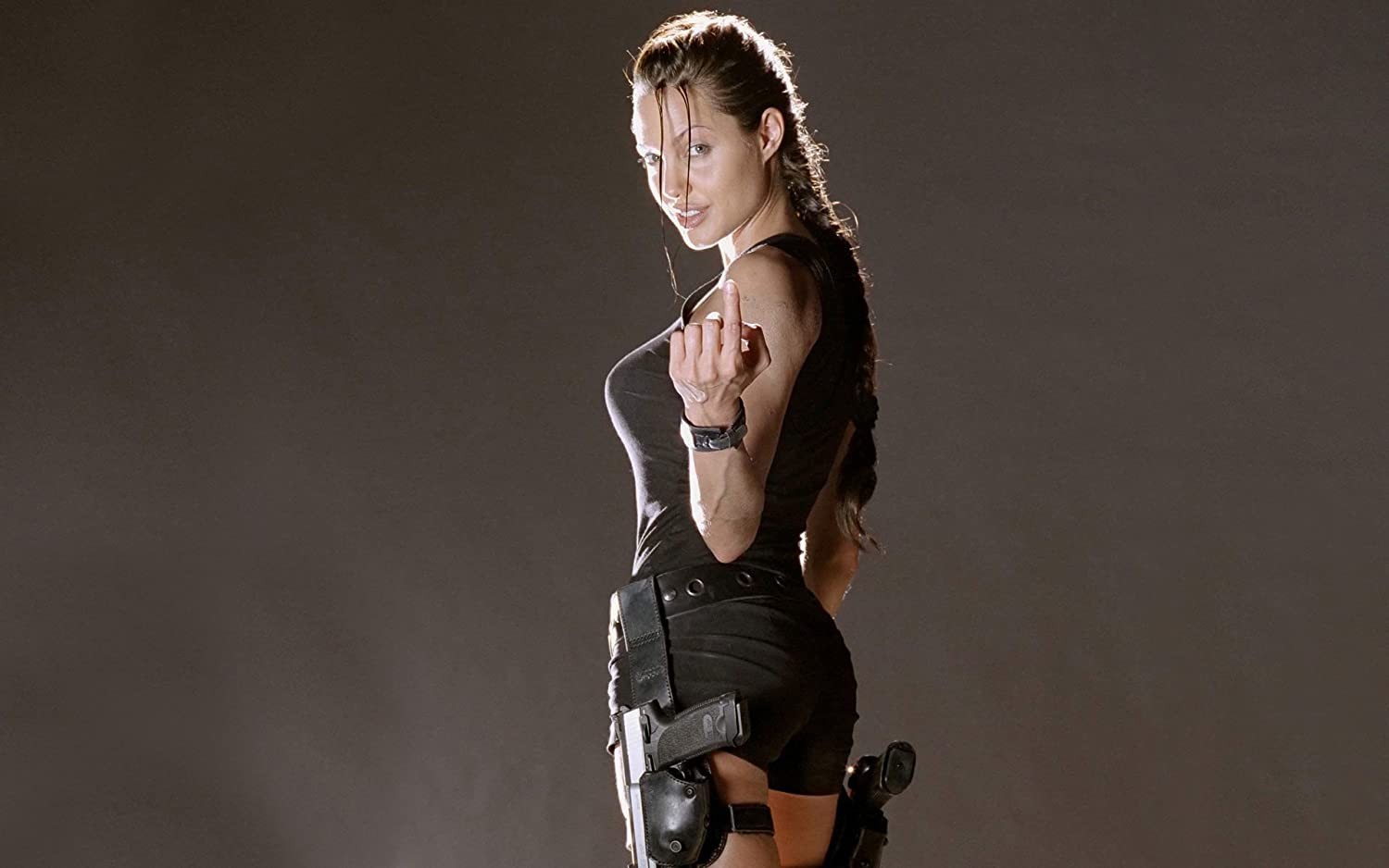 Angelina Jolie for Tomb Raider 3 - twenty years after she brought Lara  Croft to life in the original Tomb Raider movie, Angelina Jolie returns to  action in Warner's “Those who wish