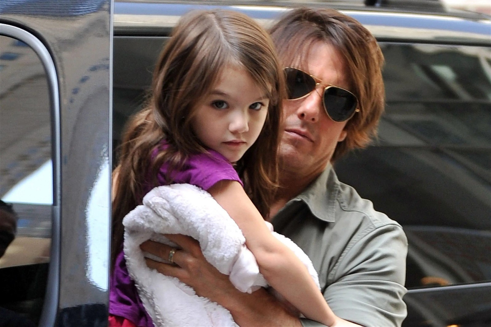 Suri Cruise with father Tom Cruise as a child