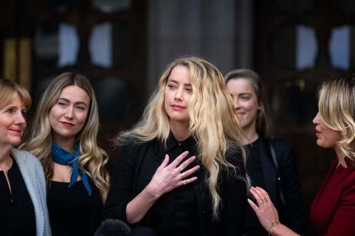 Amber Heard addresses the audience after the libel trial