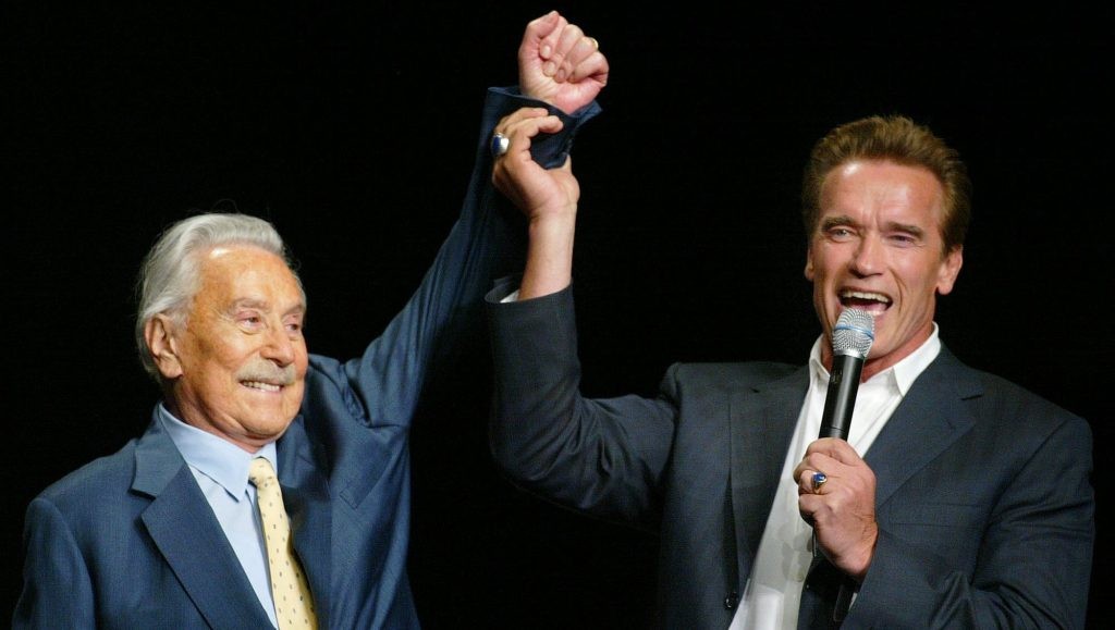 Arnold Schwarzenegger alongside his former mentor Joe Wieder 