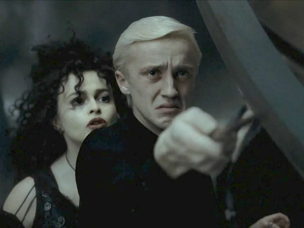 Tom Felton as Draco Malfoy with Helena Bonham Carter's Bellatrix Lestrange