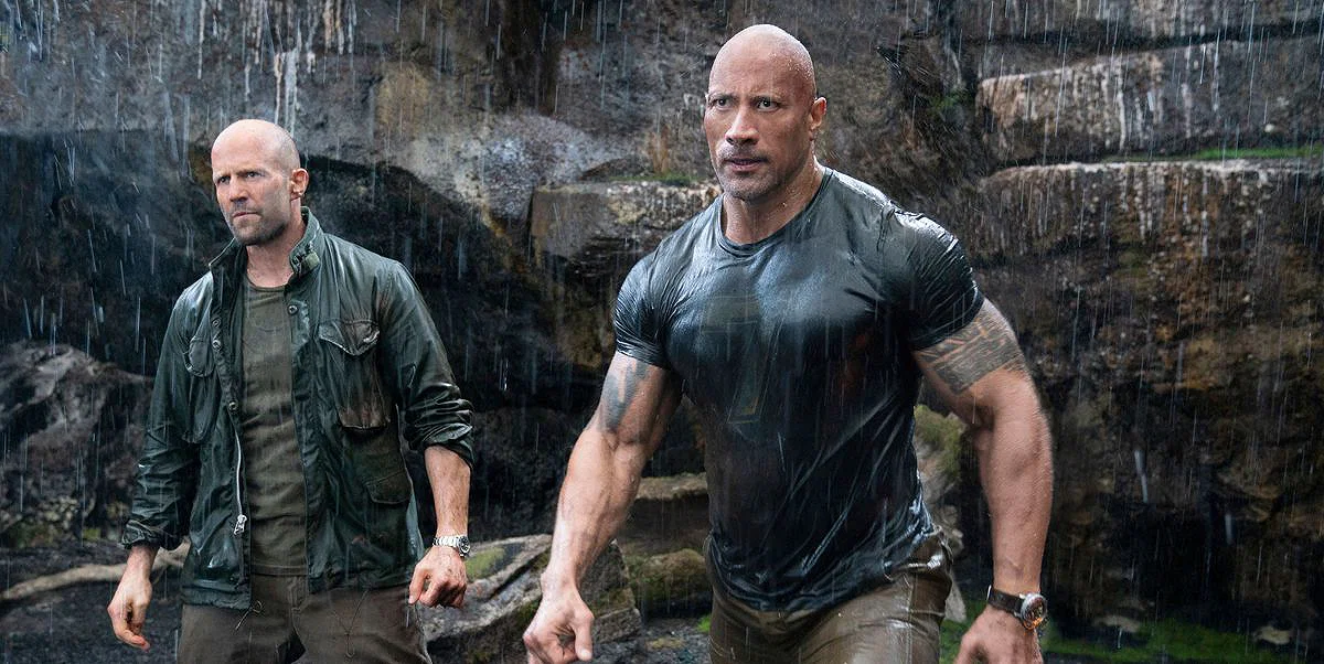 Dwayne Johnson and Jason Statham as Hobbs and Shaw looking to fight in rain