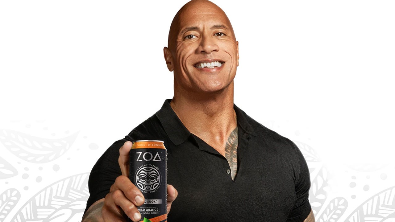 Dwayne Johnson holds a can of the new energy drink. 