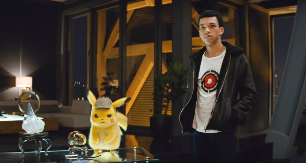 A still from Pokémon Detective Pikachu with Ryan Reynolds.