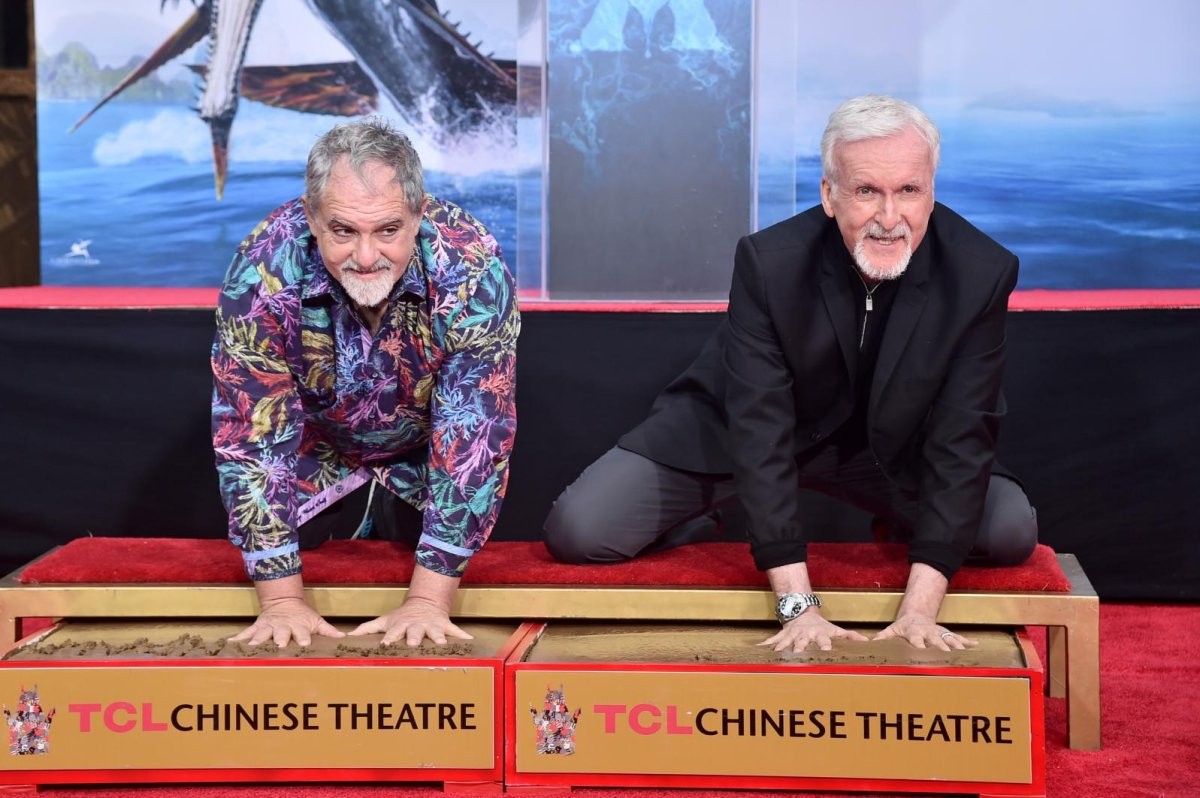 Jon Landau and James Cameron immortalized their hands at TCL Chinese Theater