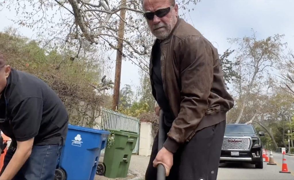 Arnold Schwarzenegger fixes neighborhood pothole by himself 